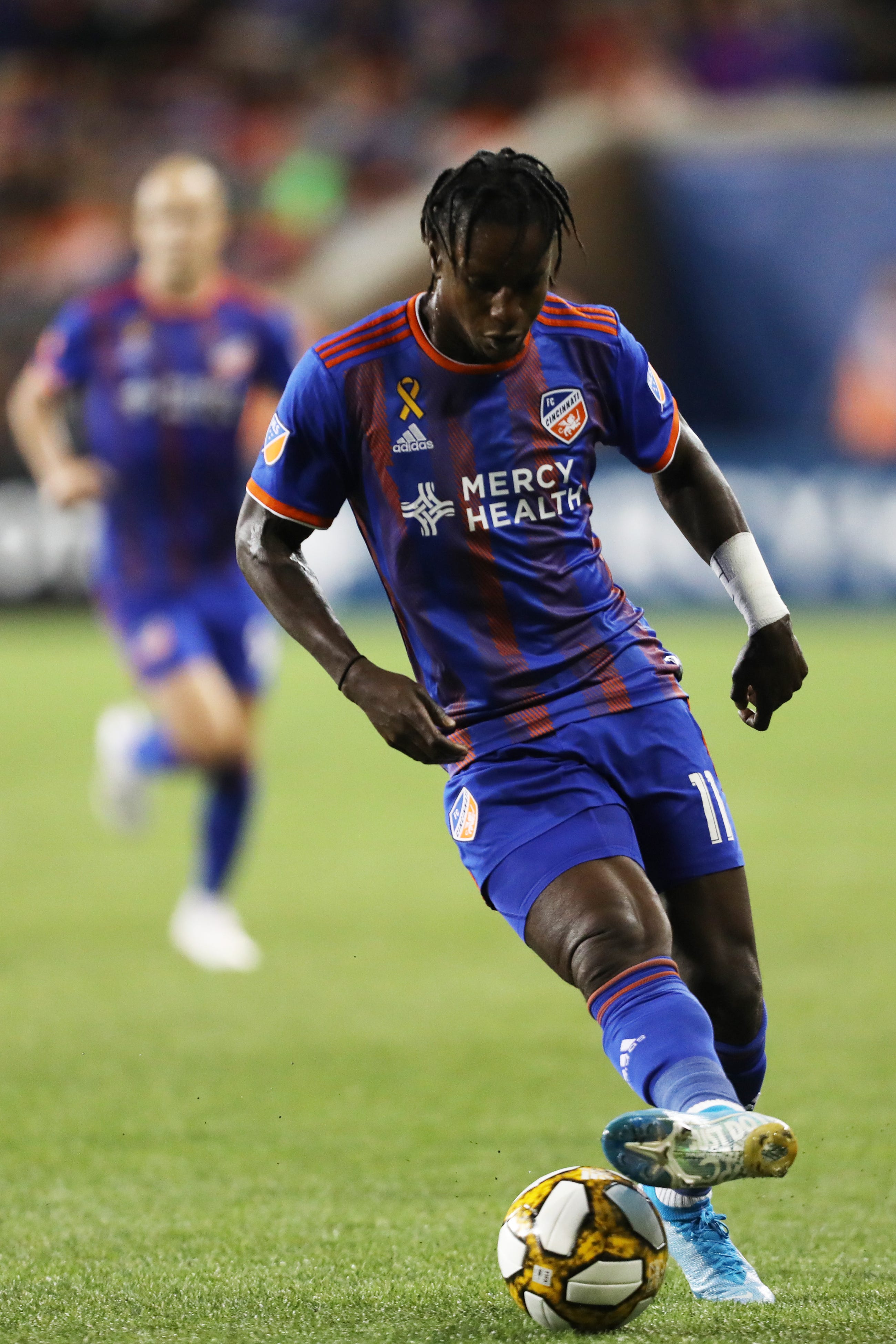 FCC forward Darren Mattocks (11) takes the ball down the field during the FC Cincinnati vs Toronto FC match on Saturday, Sept. 7, 2019 at Nippert Stadium in Cincinnati, Ohio.